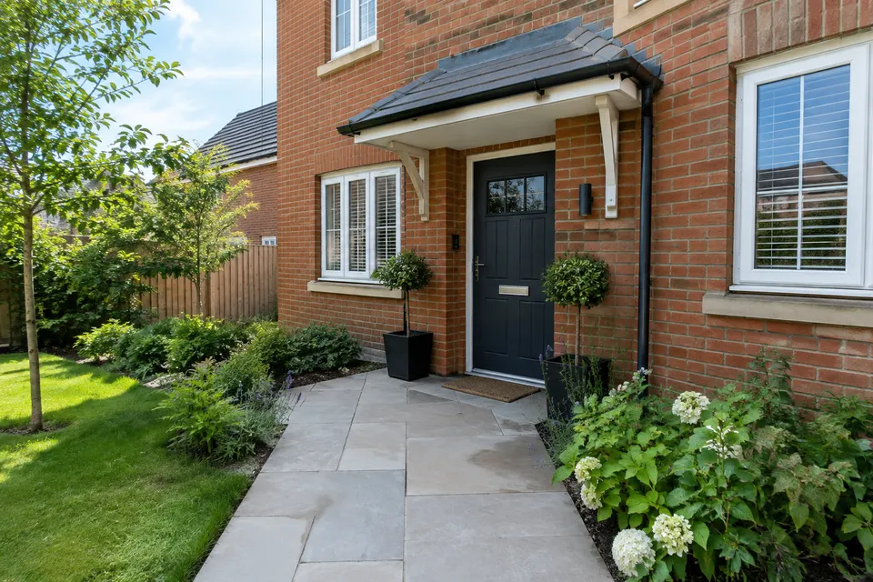 A tidy brick house and entrance path